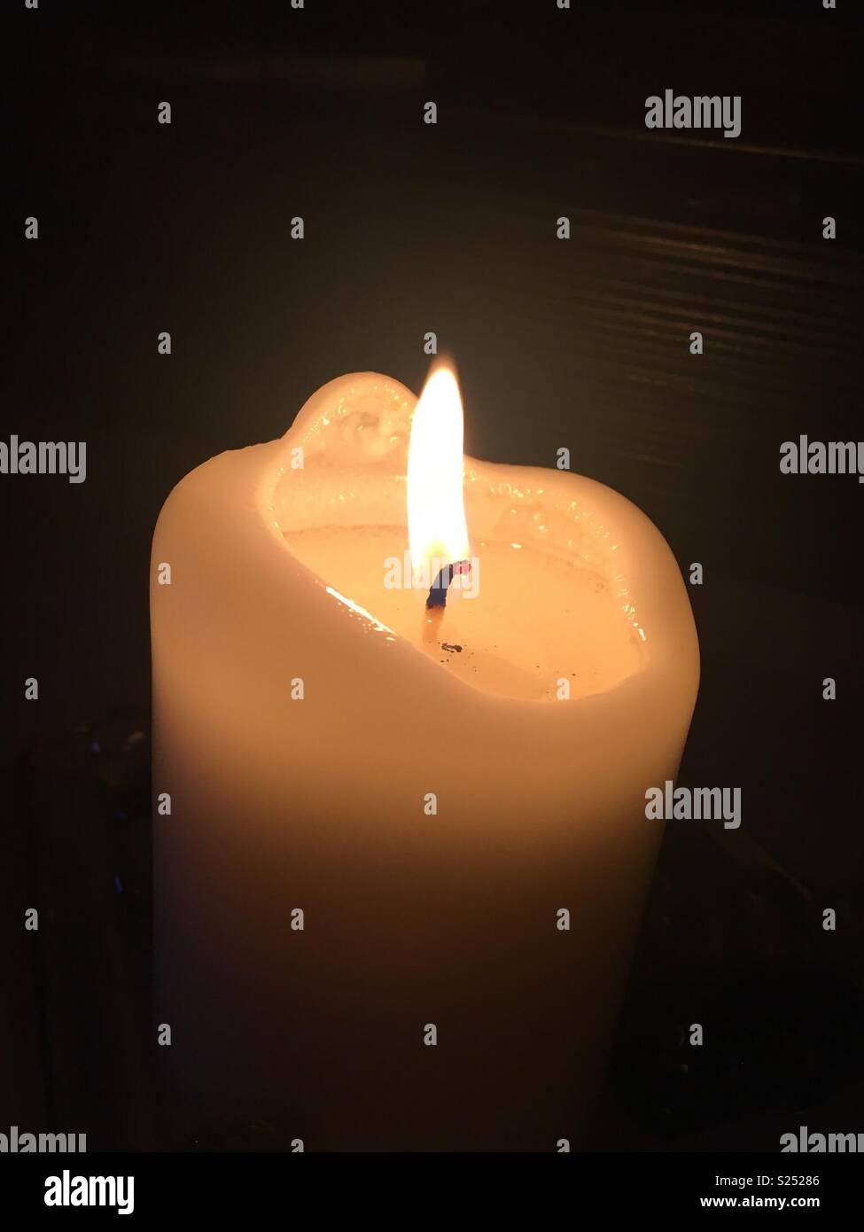 Candle burning Stock Photo Alamy