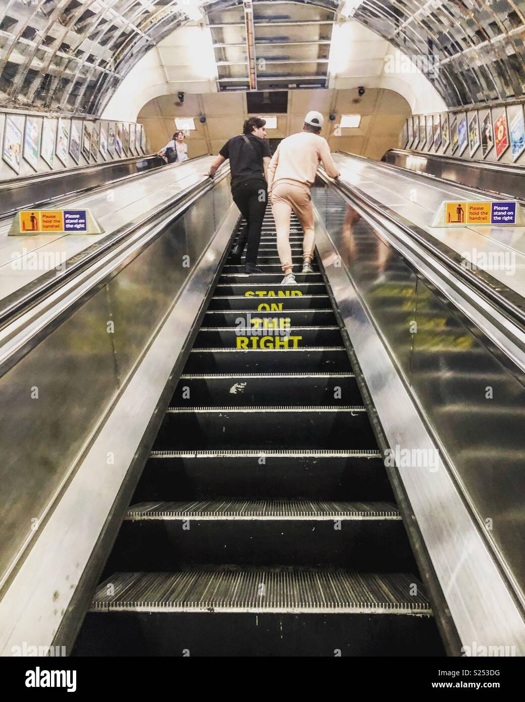 Stand on the right. Escalators at Liverpool Street Station Stock Photo