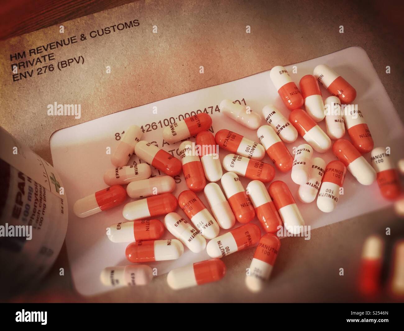 Drugs scattered on top of post from the Tax office - Smartphone Captured Stock Image