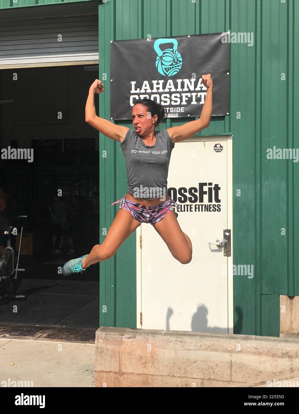 Me Lyra jumping in the air feeling so strong and healthy at 40 after a Crossfit class in Lahaina, Maui Stock Photo