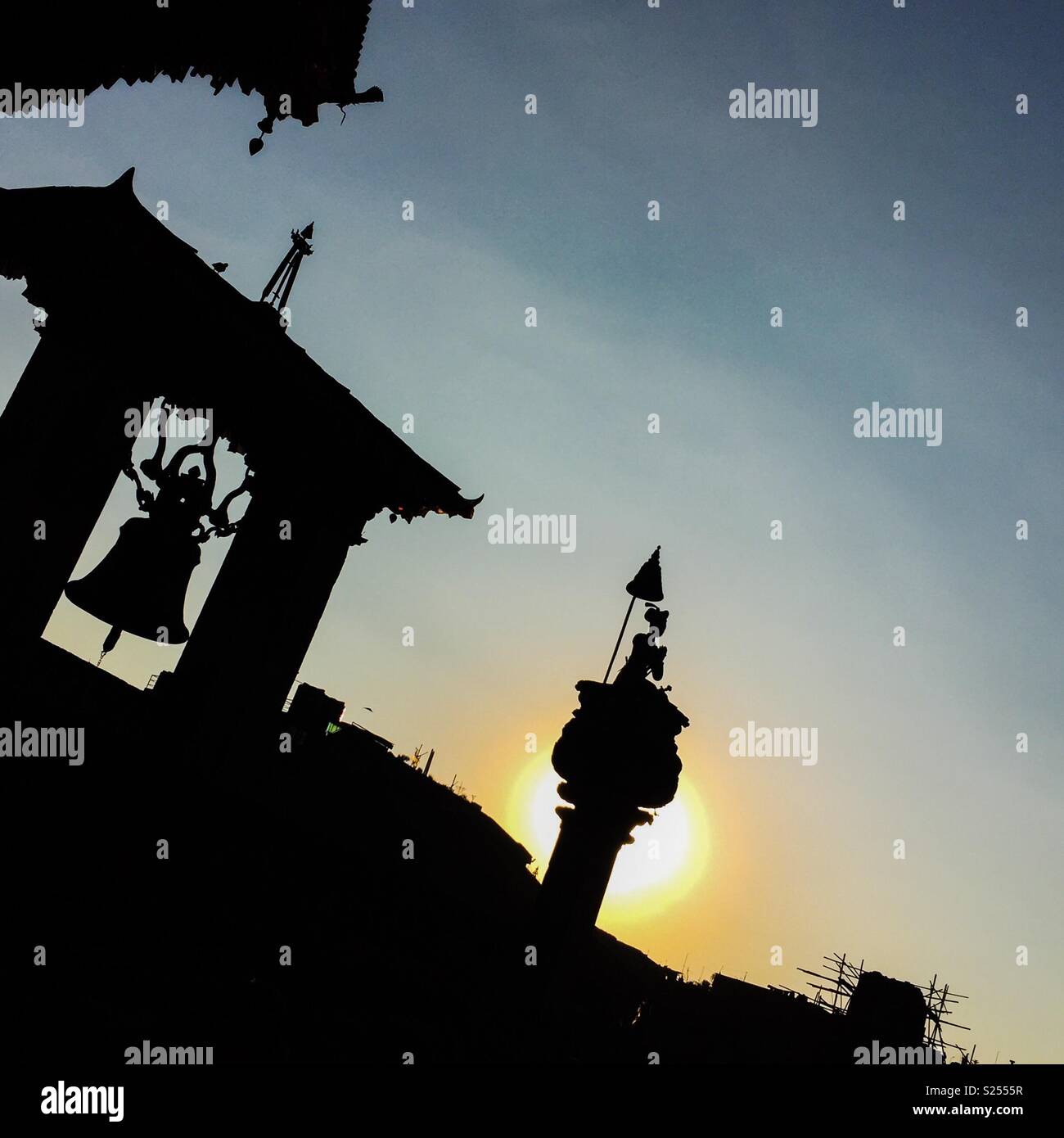 Big bell at sunset, Durbar Square, Bhaktapur, Nepal - Smartphone Captured Stock Image