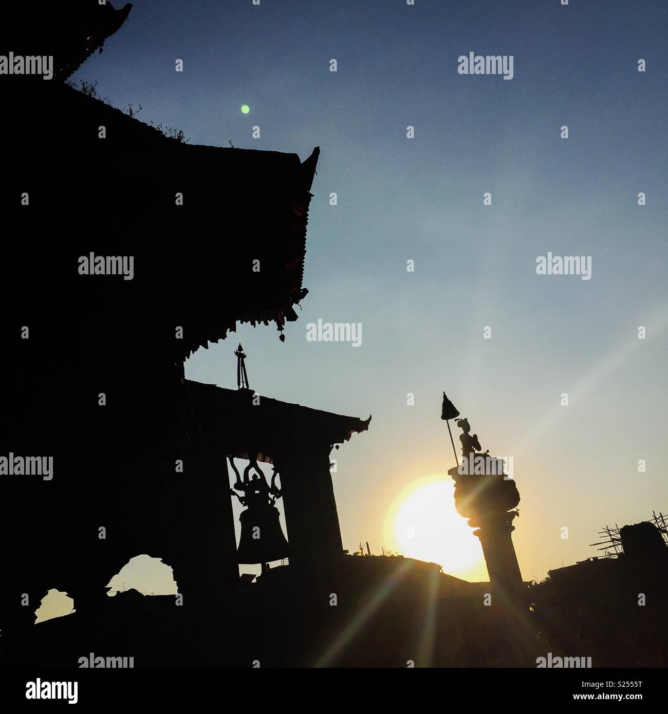 Big bell at sunset, Durbar Square, Bhaktapur, Nepal - Smartphone Captured Stock Image