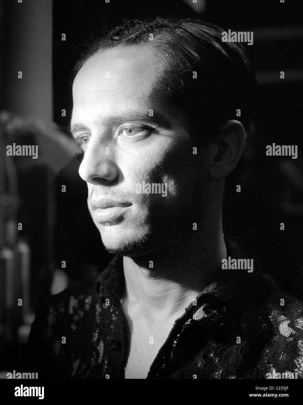 Nick with eyeliner and braids - Smartphone Captured Stock Image