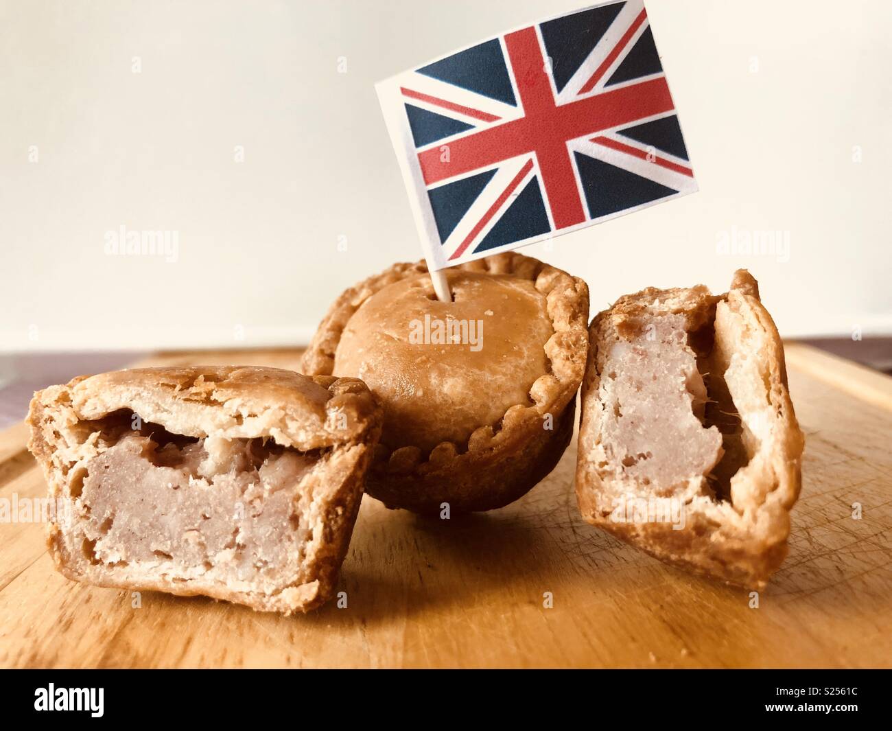 Pork pie with British flag pick Stock Photo Alamy