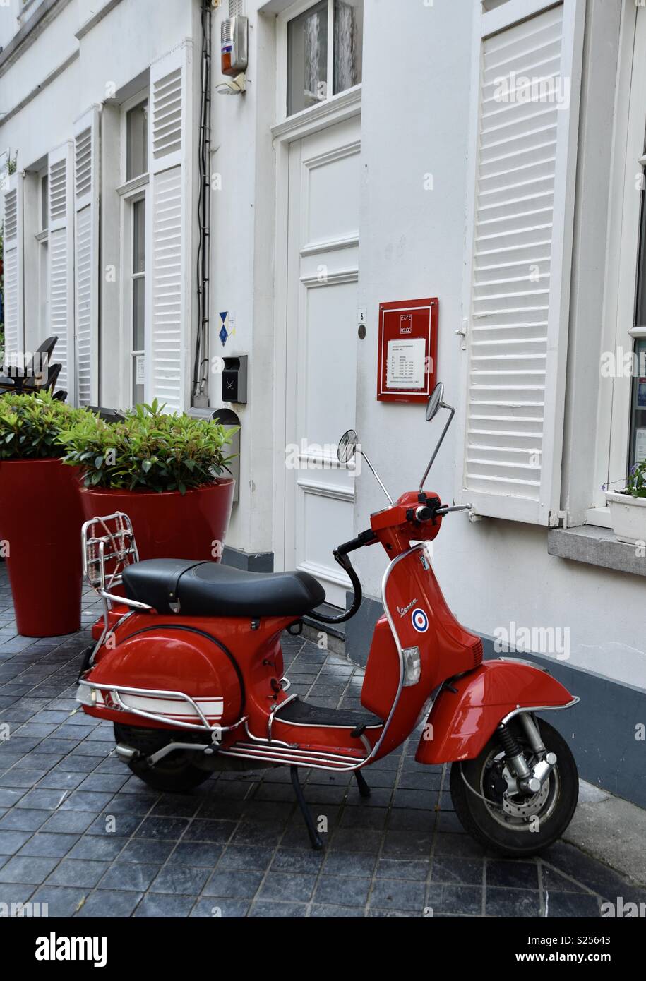 Red and white scooter hires stock photography and images Alamy