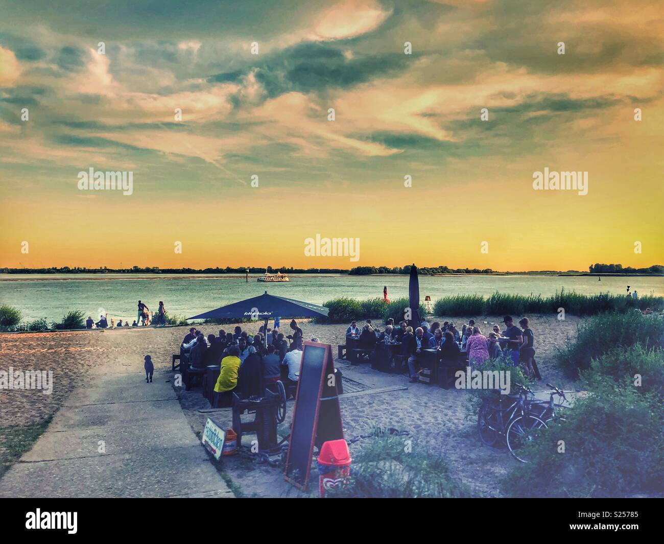 Dinner on the beach in Blankenese, Hamburg, Germany. - Smartphone Captured Stock Image
