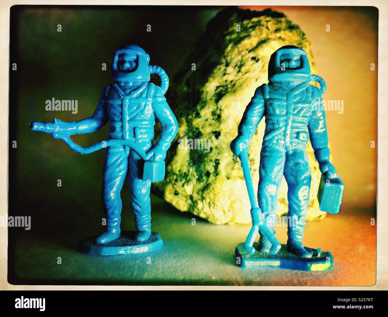 Vintage spacemen toys with rock Stock Photo - Alamy