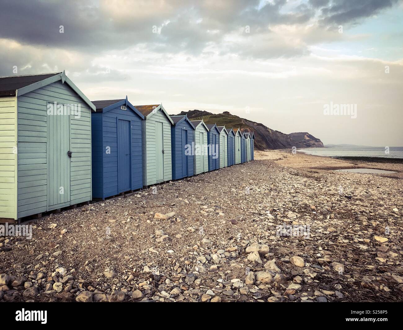 Beach huts at Charmouth Dorset Stock Photo