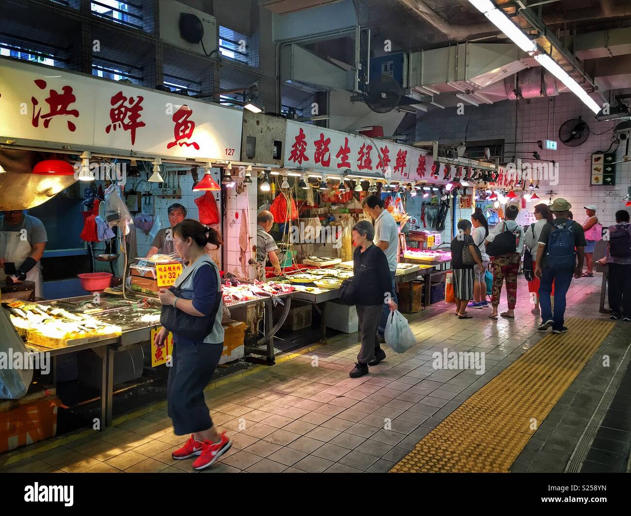 Fish shops in a 'wet market', Yuen Long, New Territories, Hong Kong - Smartphone Captured Stock Image