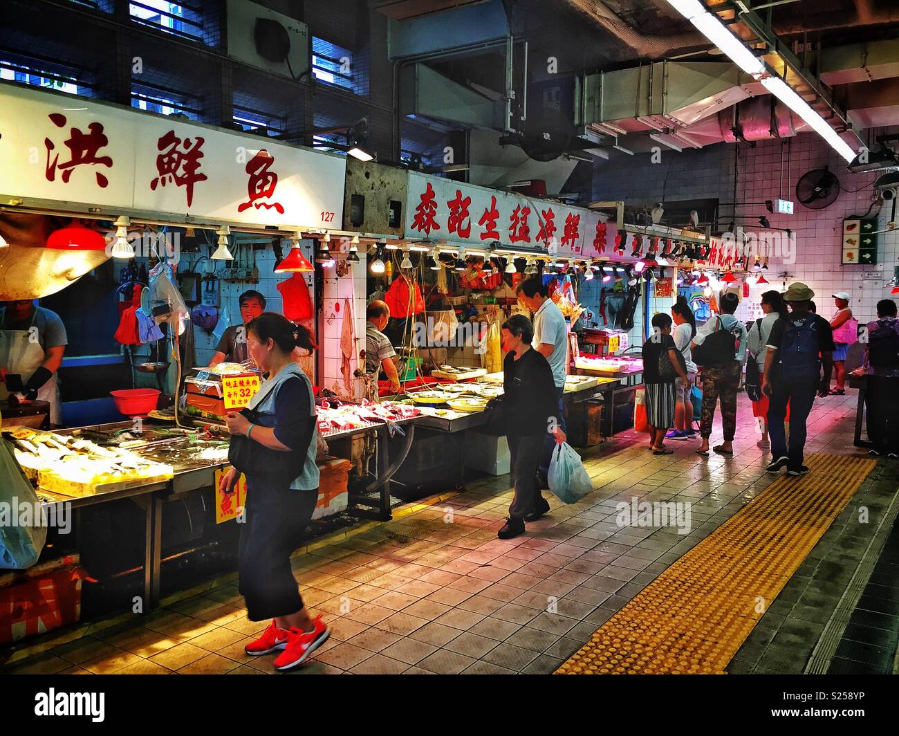 Fish shops in a 'wet market', Yuen Long, New Territories, Hong Kong - Smartphone Captured Stock Image