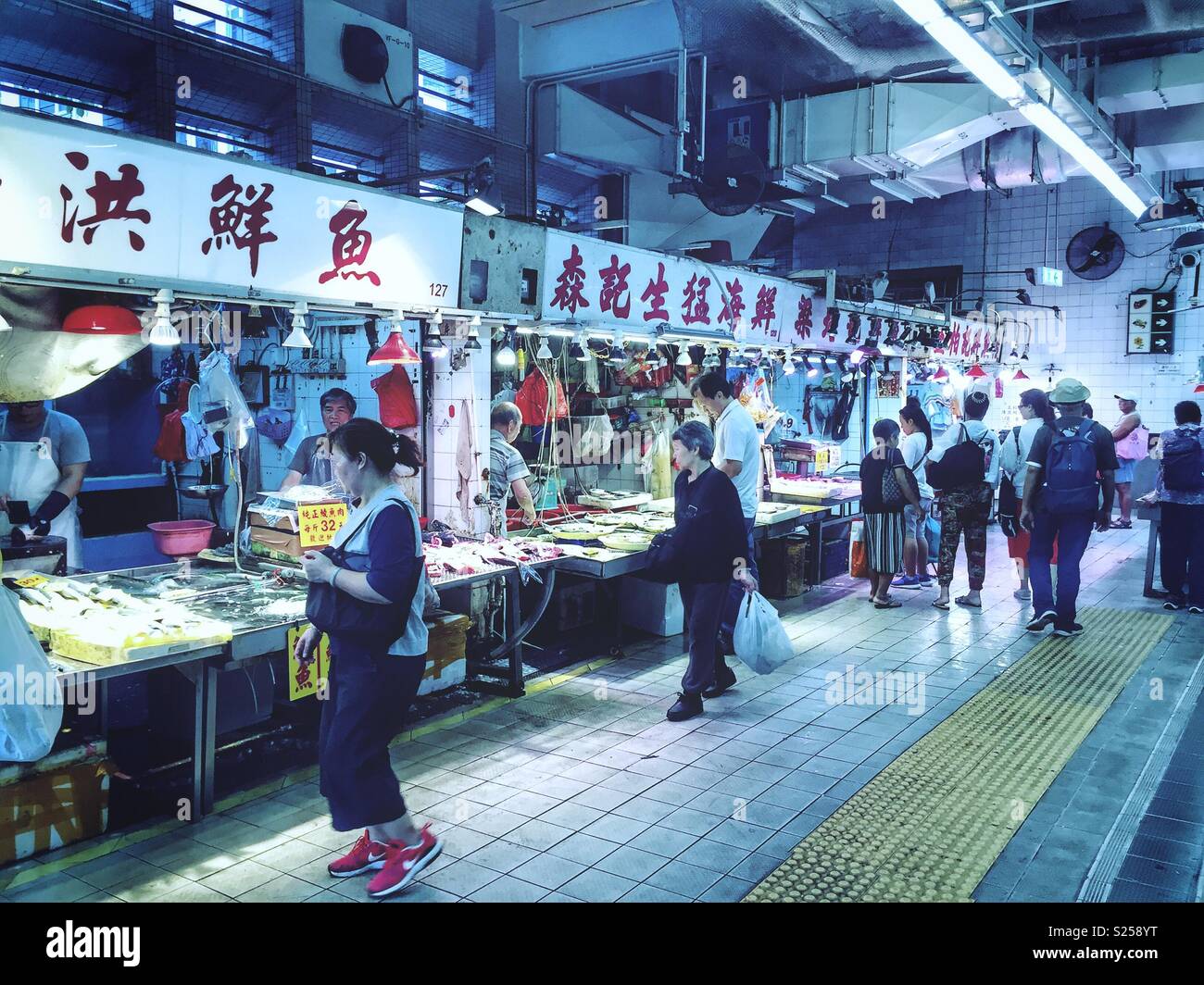 Fish shops in a 'wet market', Yuen Long, New Territories, Hong Kong - Smartphone Captured Stock Image