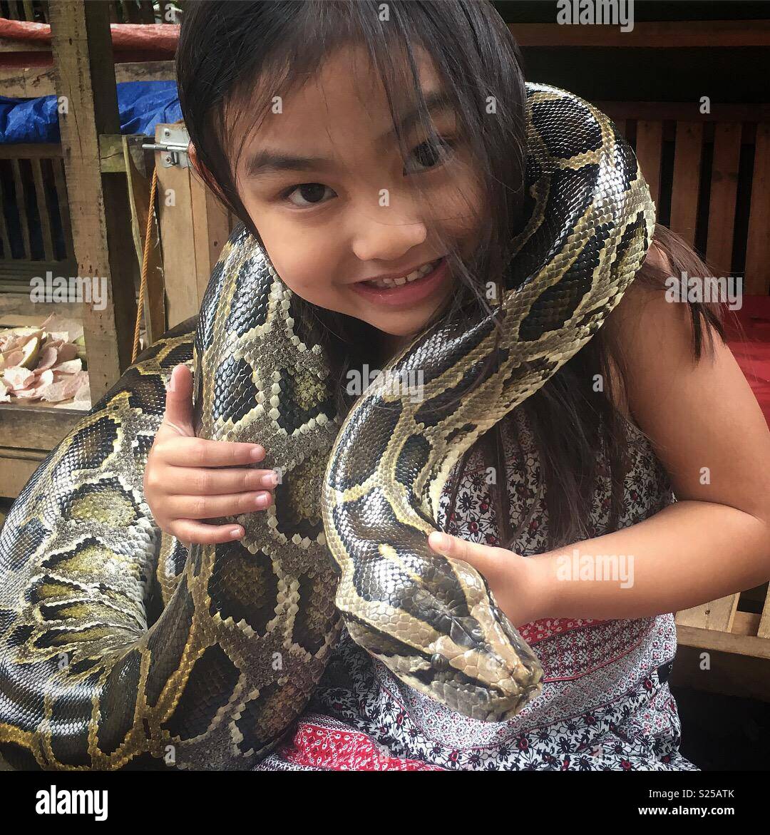 Burmese Python Eats Child