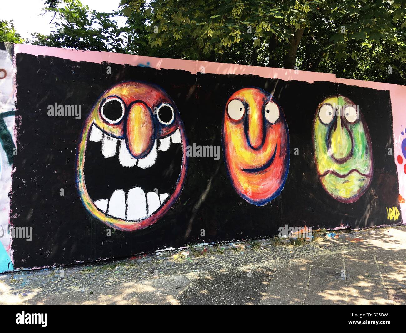 Graffiti of faces in different states of emotions Stock Photo