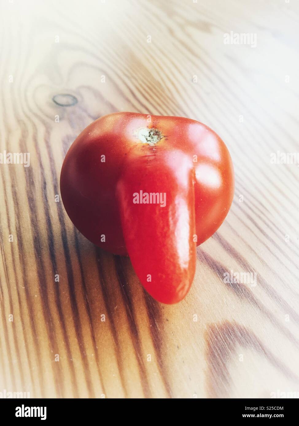 Misshapen tomato Stock Photo