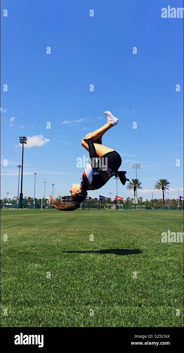 Backflip in grass Stock Photo Alamy
