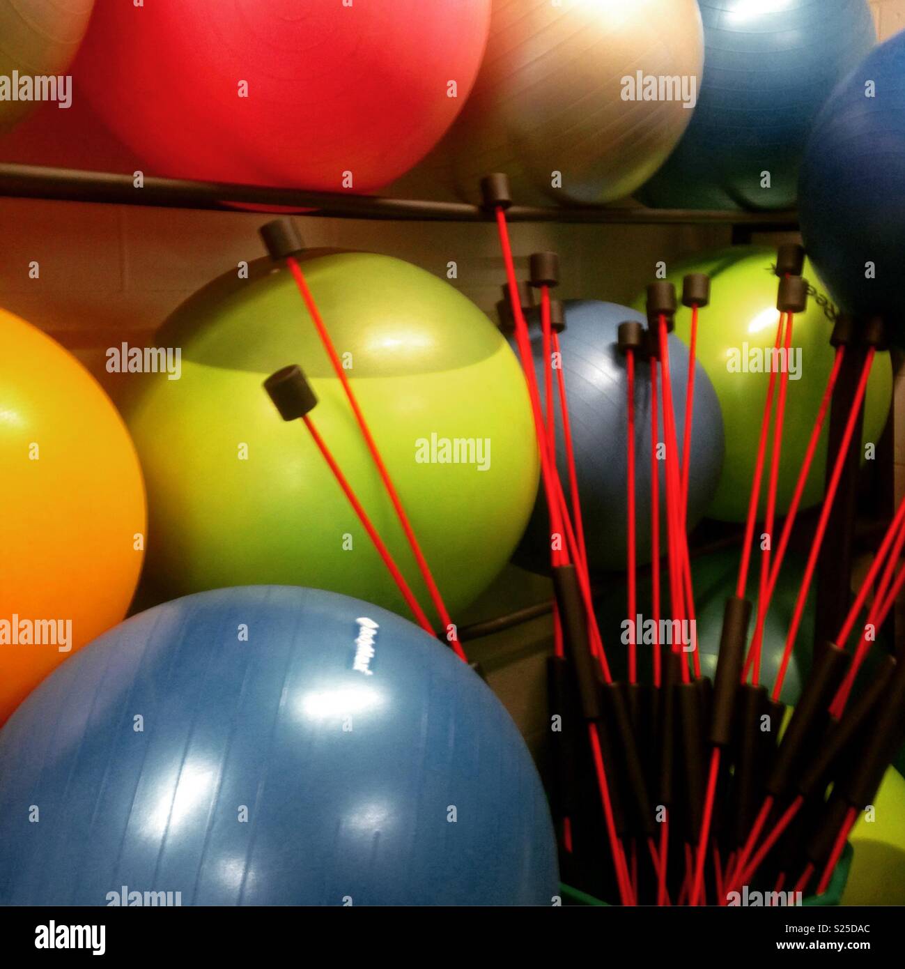 Gym store room colourful exercise balls. Mobile phone photo with some phone or tablet post processing. - Smartphone Captured Stock Image