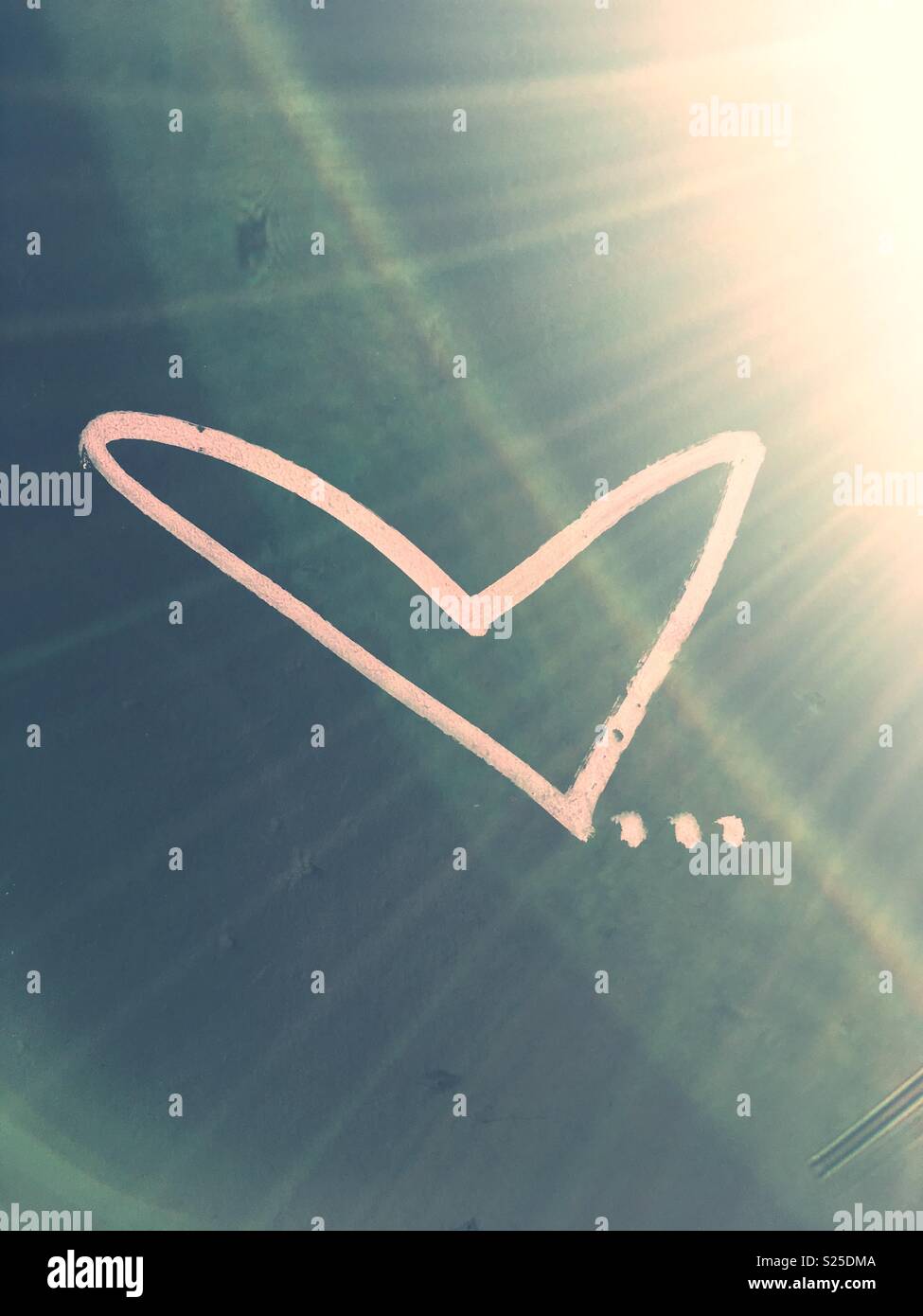 Heart graffiti with ellipses and sun rays - Smartphone Captured Stock Image