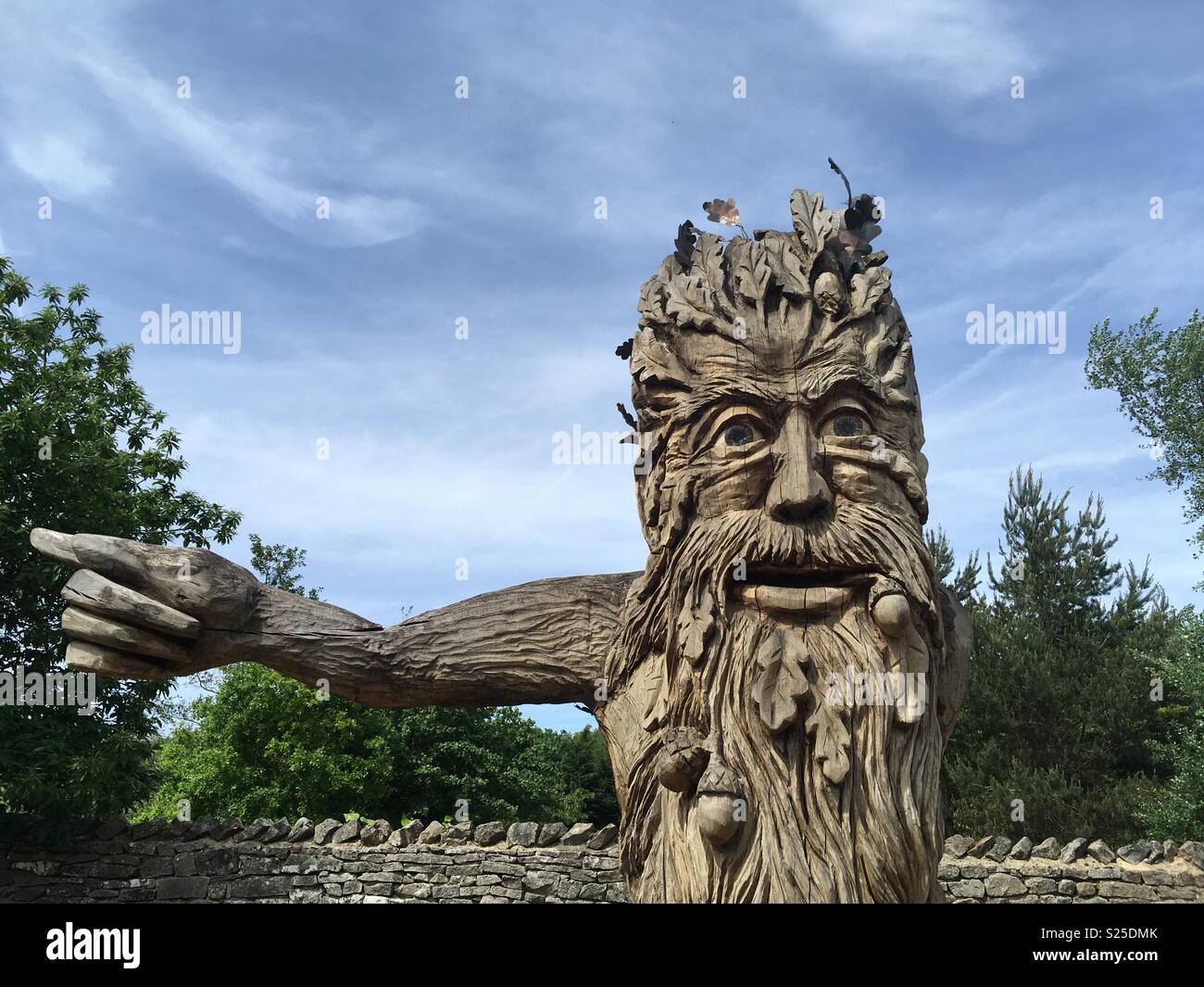 Tree man pointing the way Stock Photo