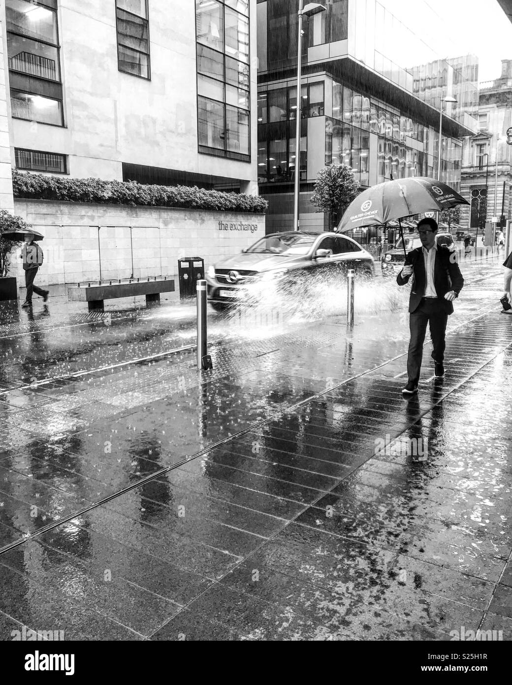 It’s raining it’s poring, Manchester Stock Photo