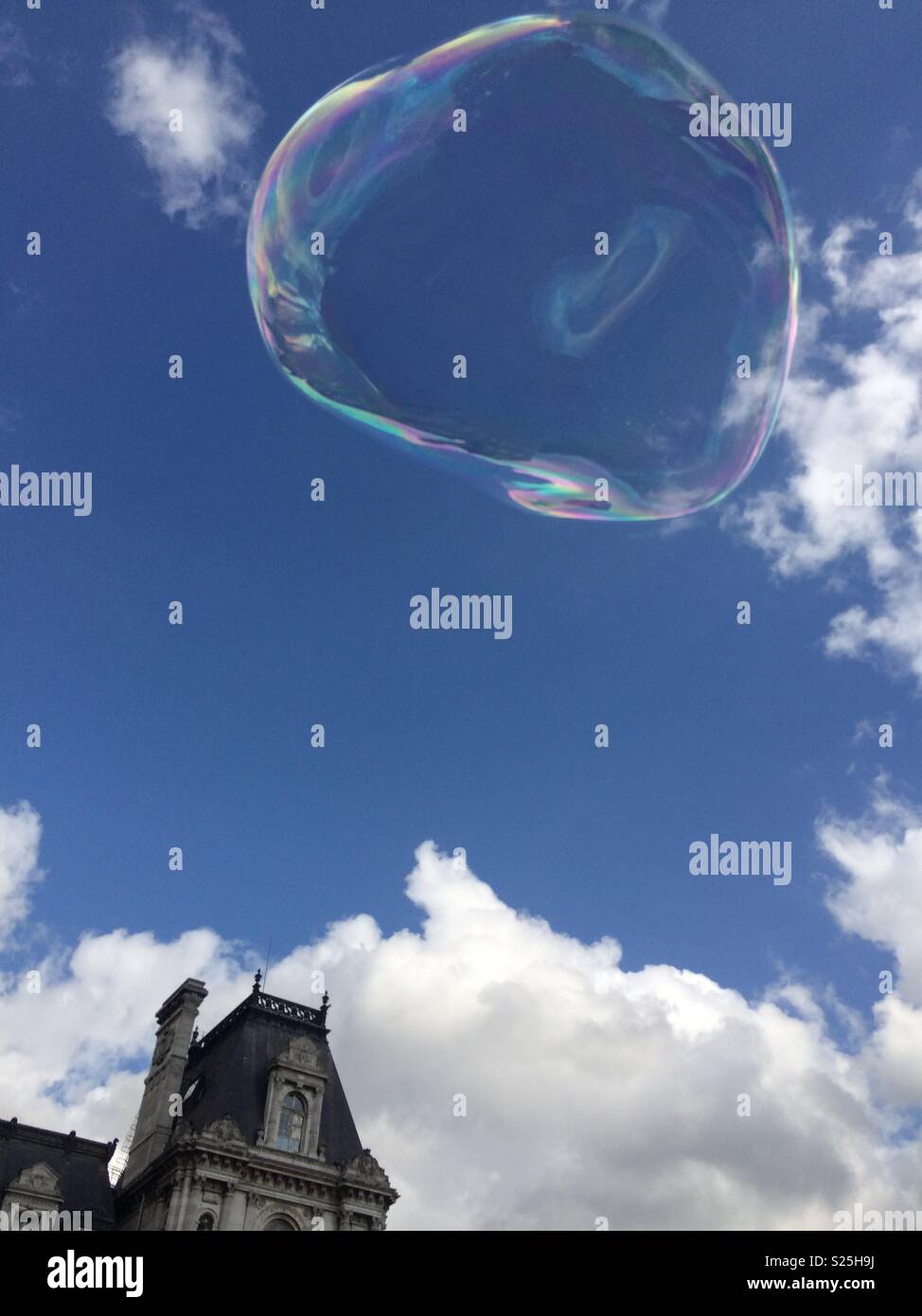 Large bubble against a blue sky in Paris Stock Photo