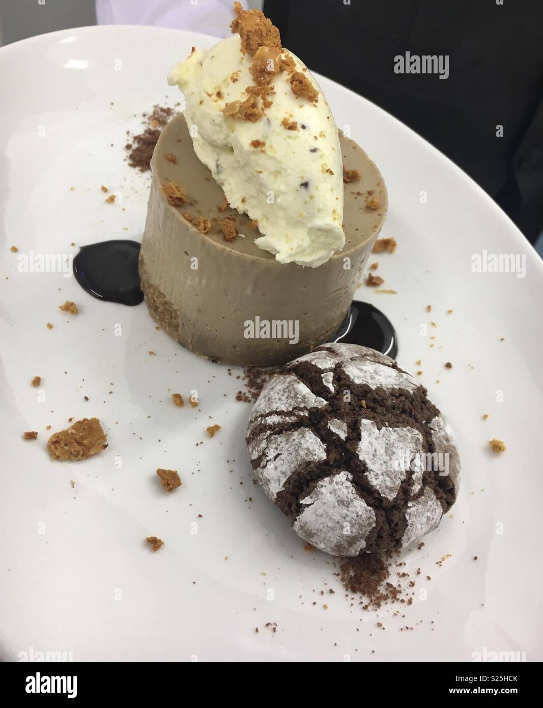 Mint aero cheesecake with a truffle cookie, honeycomb, mint creme and chocolate ganache. Stock Photo
