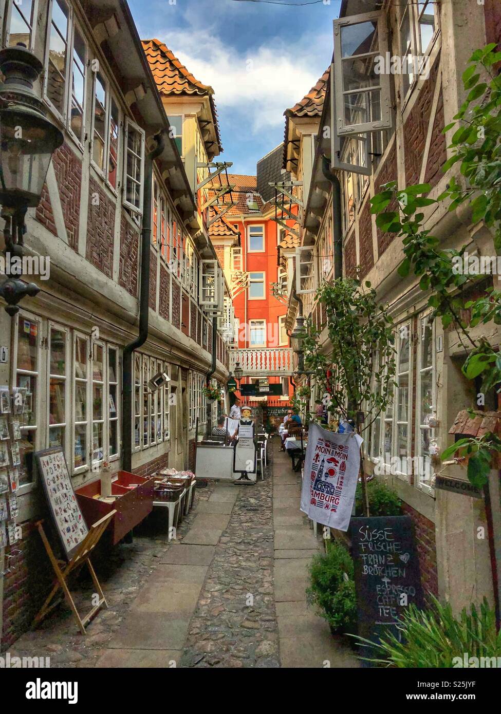 Narrow alley of preserved heritage buildings in Hamburg, Germany. - Smartphone Captured Stock Image