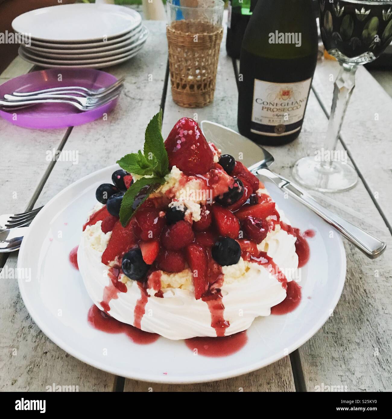 Summer fruit pavlova al fresco dining - Smartphone Captured Stock Image