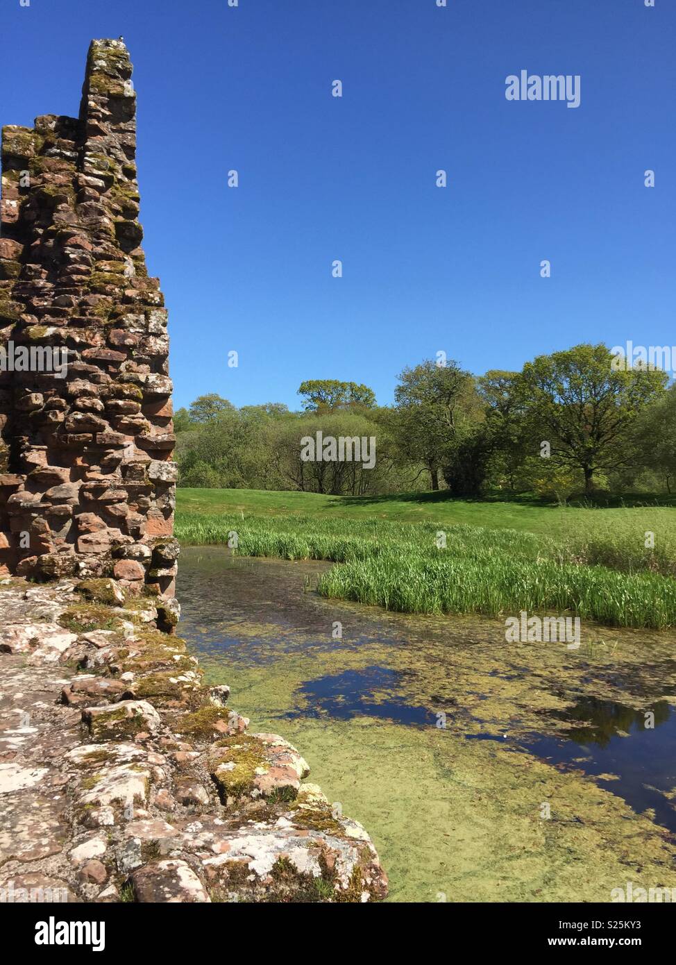 Castle wall overlooking field - Smartphone Captured Stock Image