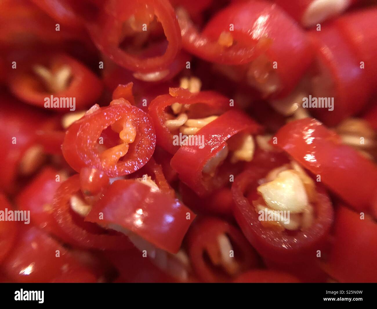 Close up of chopped red chillies Stock Photo
