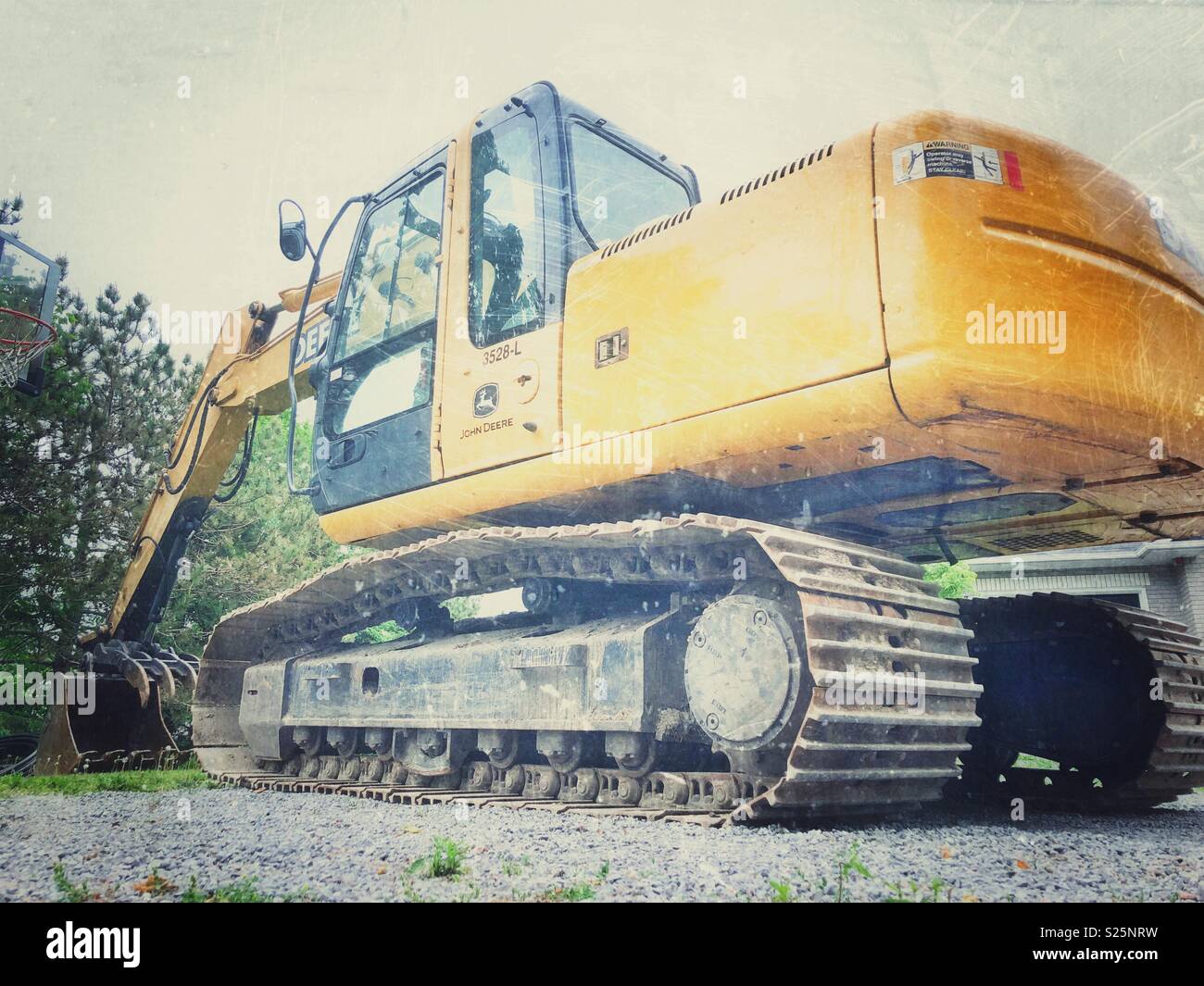 John Deere excavator at a job site - Smartphone Captured Stock Image