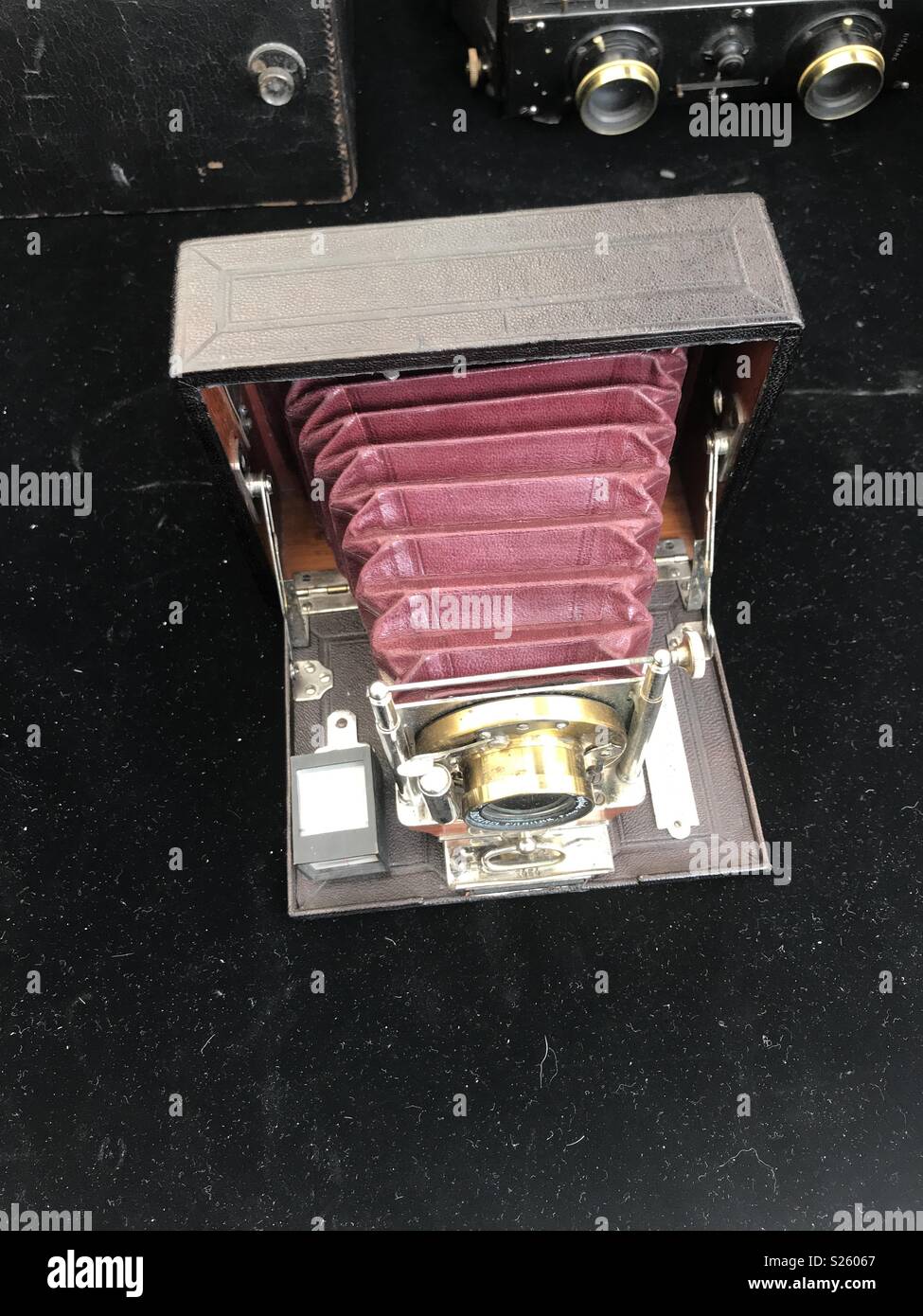 Old type camera for sell at camera fair, France - Smartphone Captured Stock Image