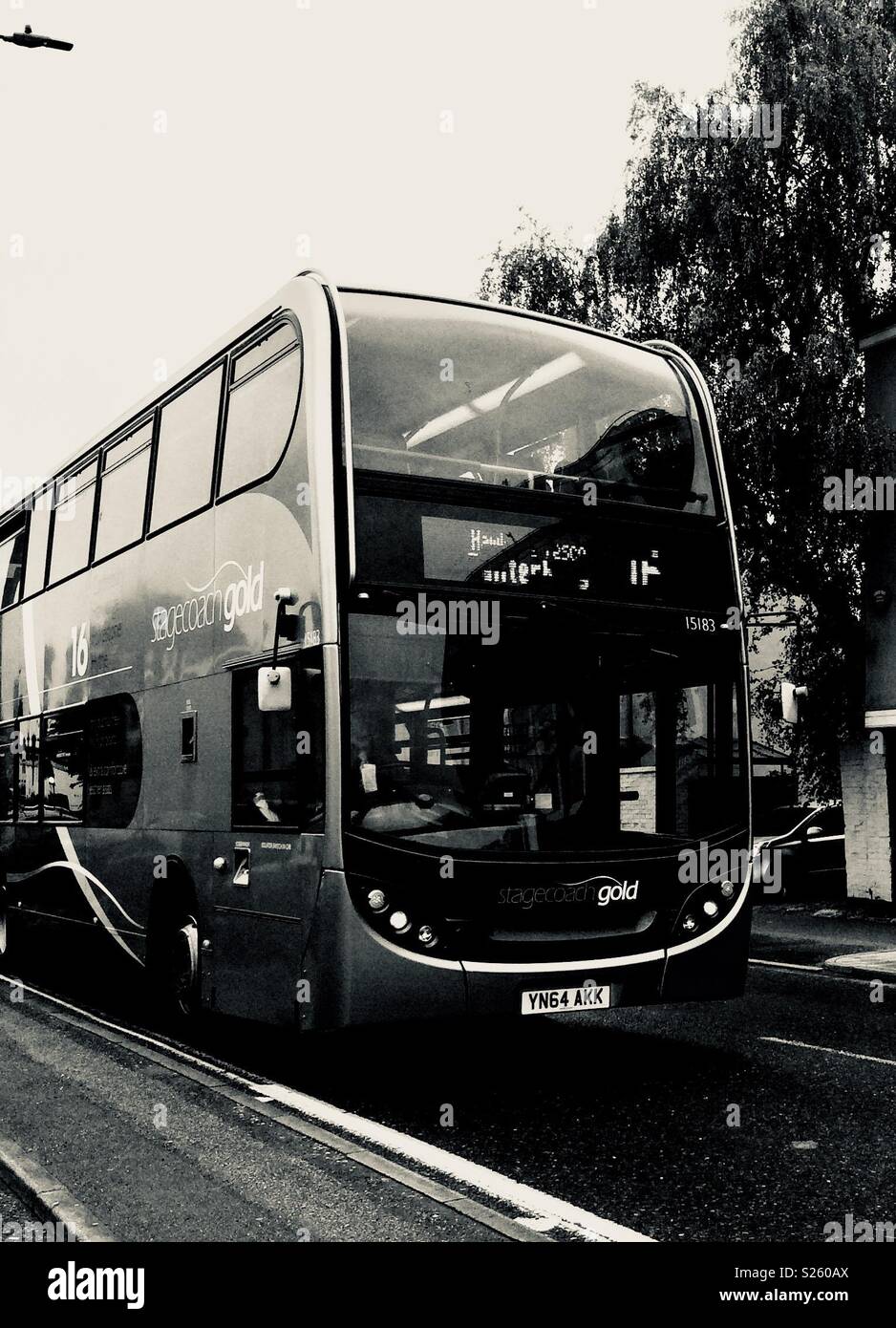 Black and white photo of stagecoach bus driving through Canterbury, Kent Stock Photo