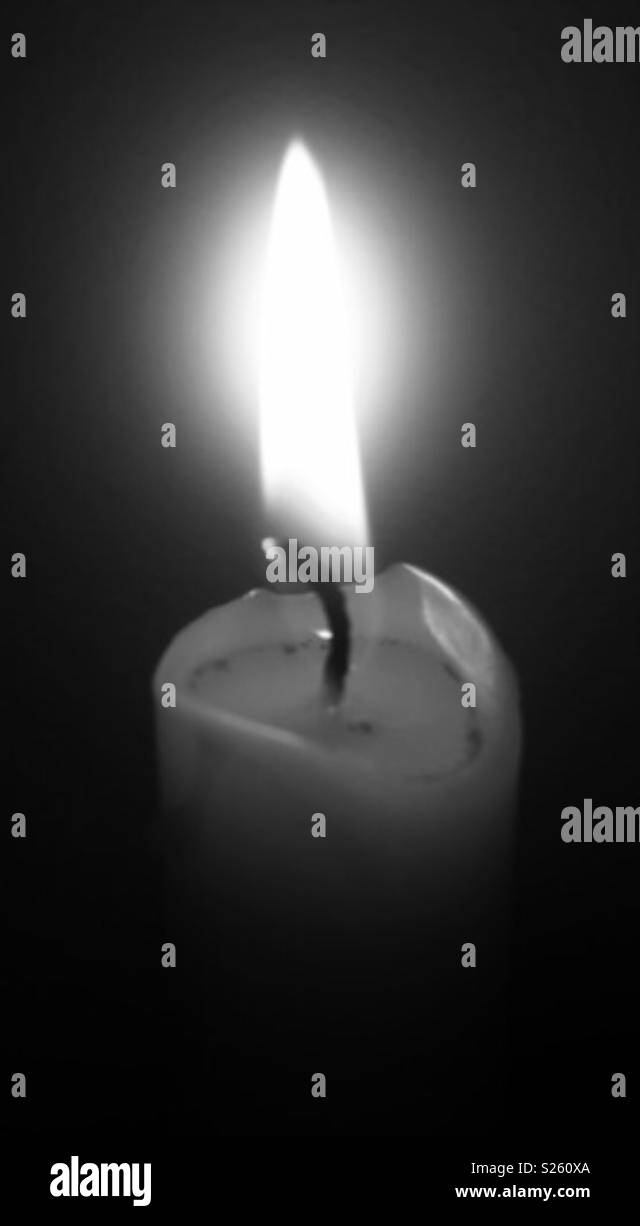 Candlelight in a darkroom Stock Photo