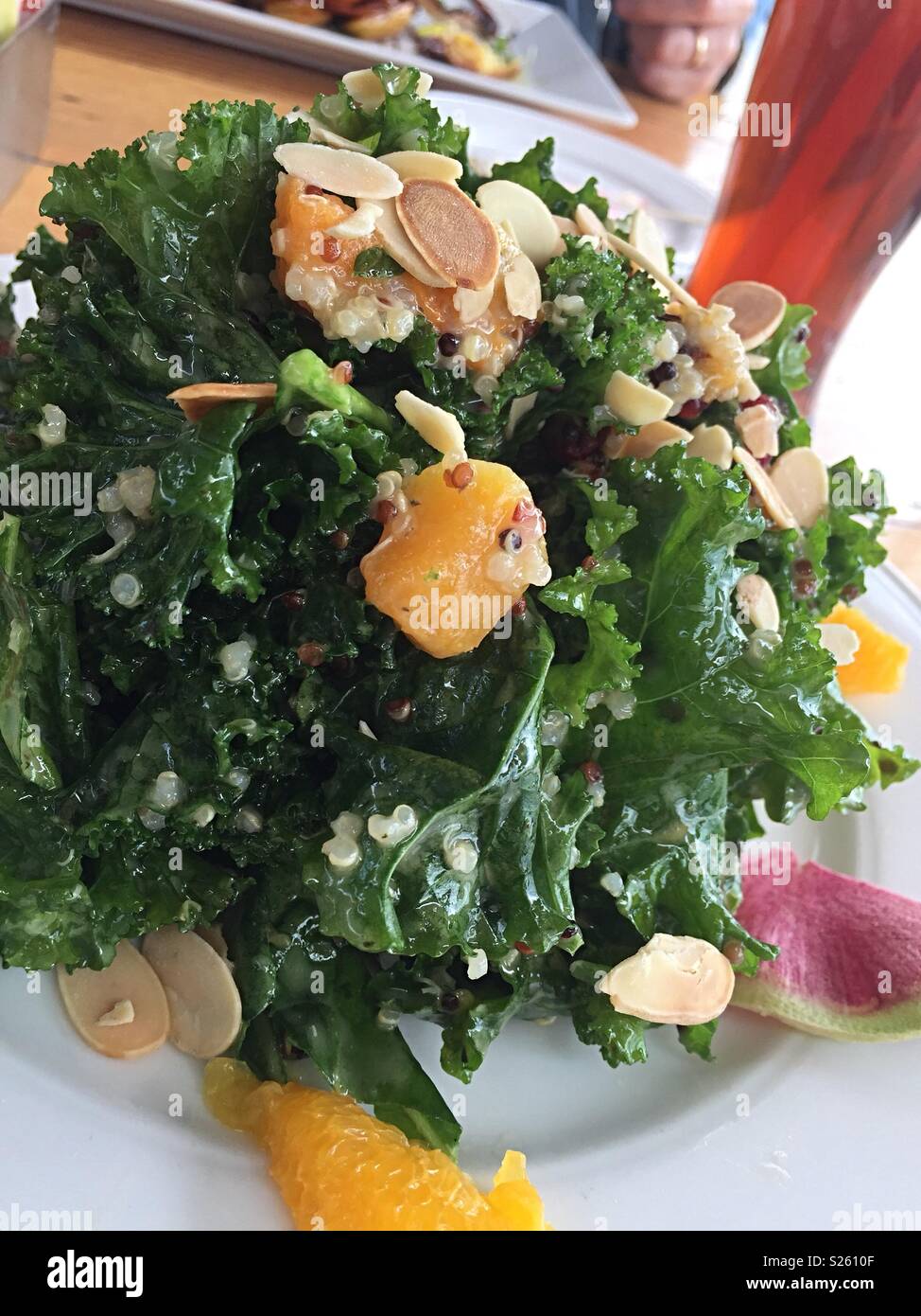 A kale and quinoa entrée salad at a restaurant , New York City, USA - Smartphone Captured Stock Image