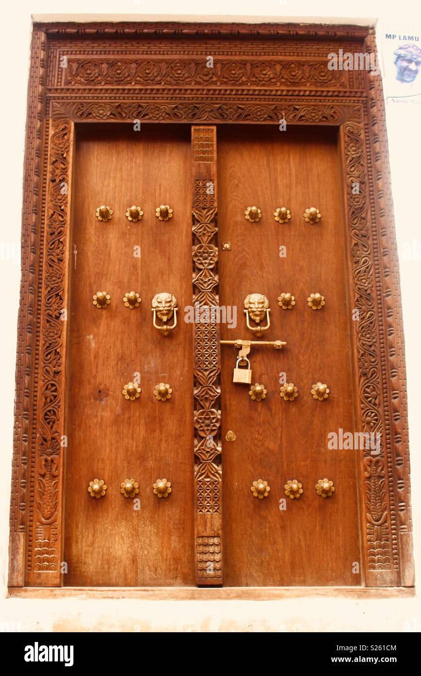 Ornate carved wooden Swahili door in Lamu, Kenya Stock Photo Alamy