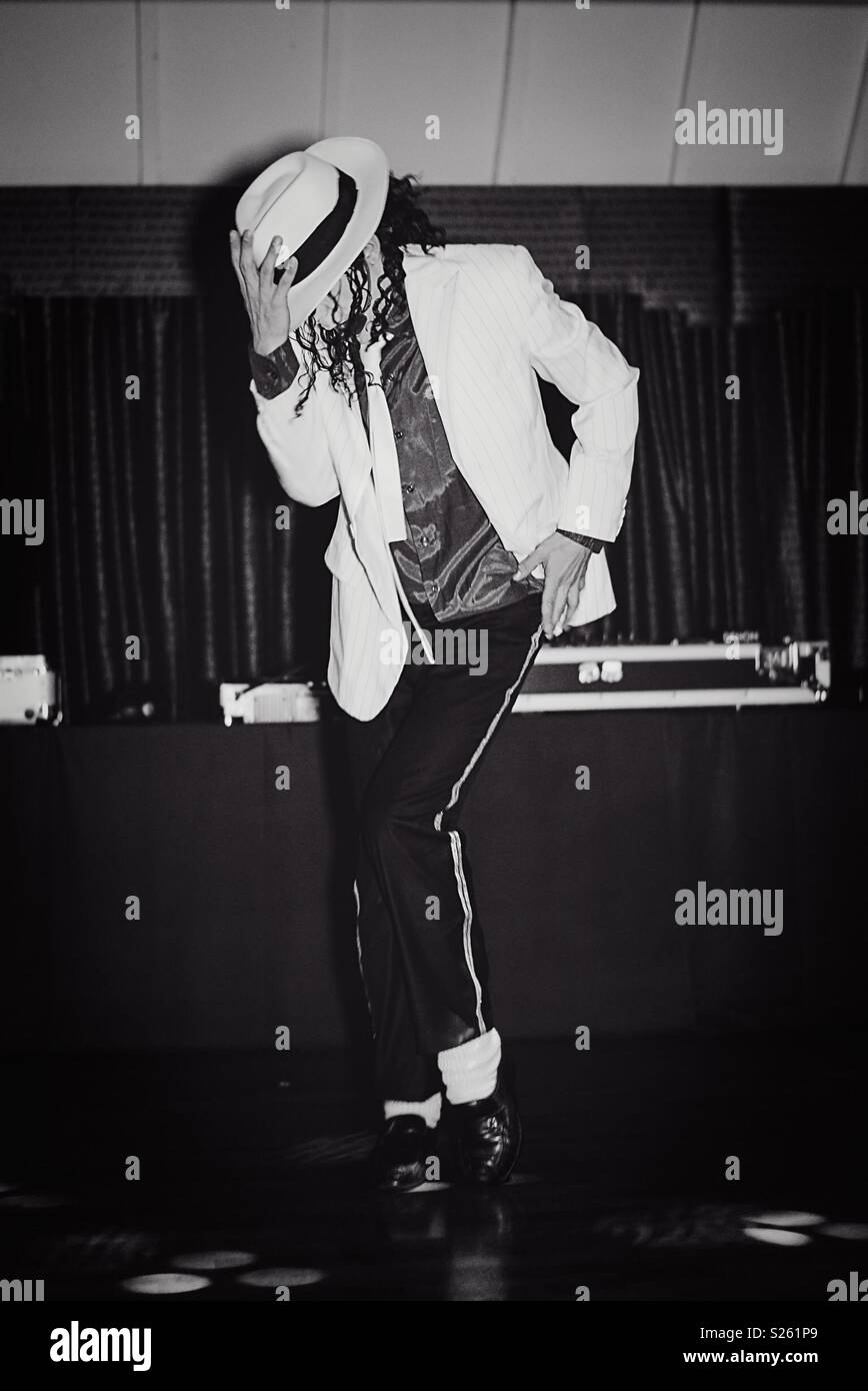 Download Michael Jackson in a signature Thriller Dance Pose Wallpaper |  Wallpapers.com