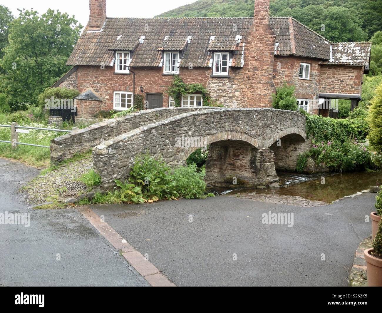 Pack horse bridge allerford Stock Photo Alamy