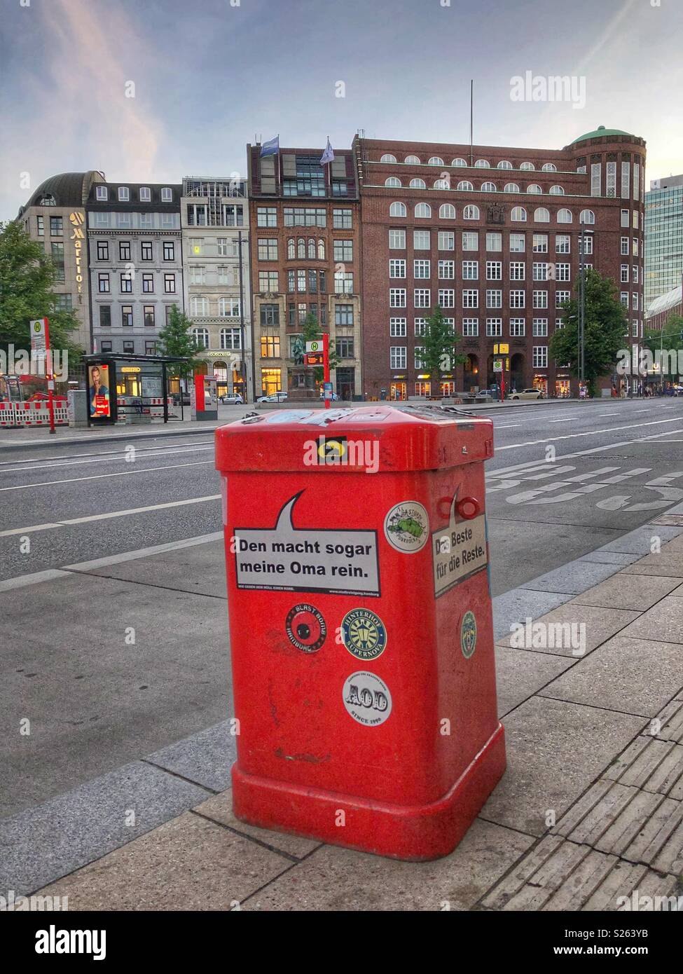 Trash cans like this with witty phrases can be seen throughout the city in Hamburg, Germany. - Smartphone Captured Stock Image