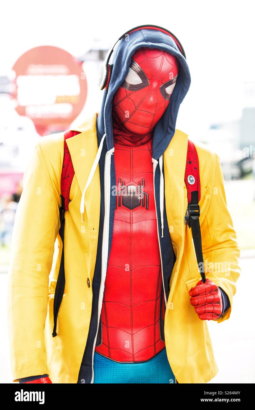 A cosplayer dressed as a cool and colourful version of Spiderman at a comic con event Stock Photo