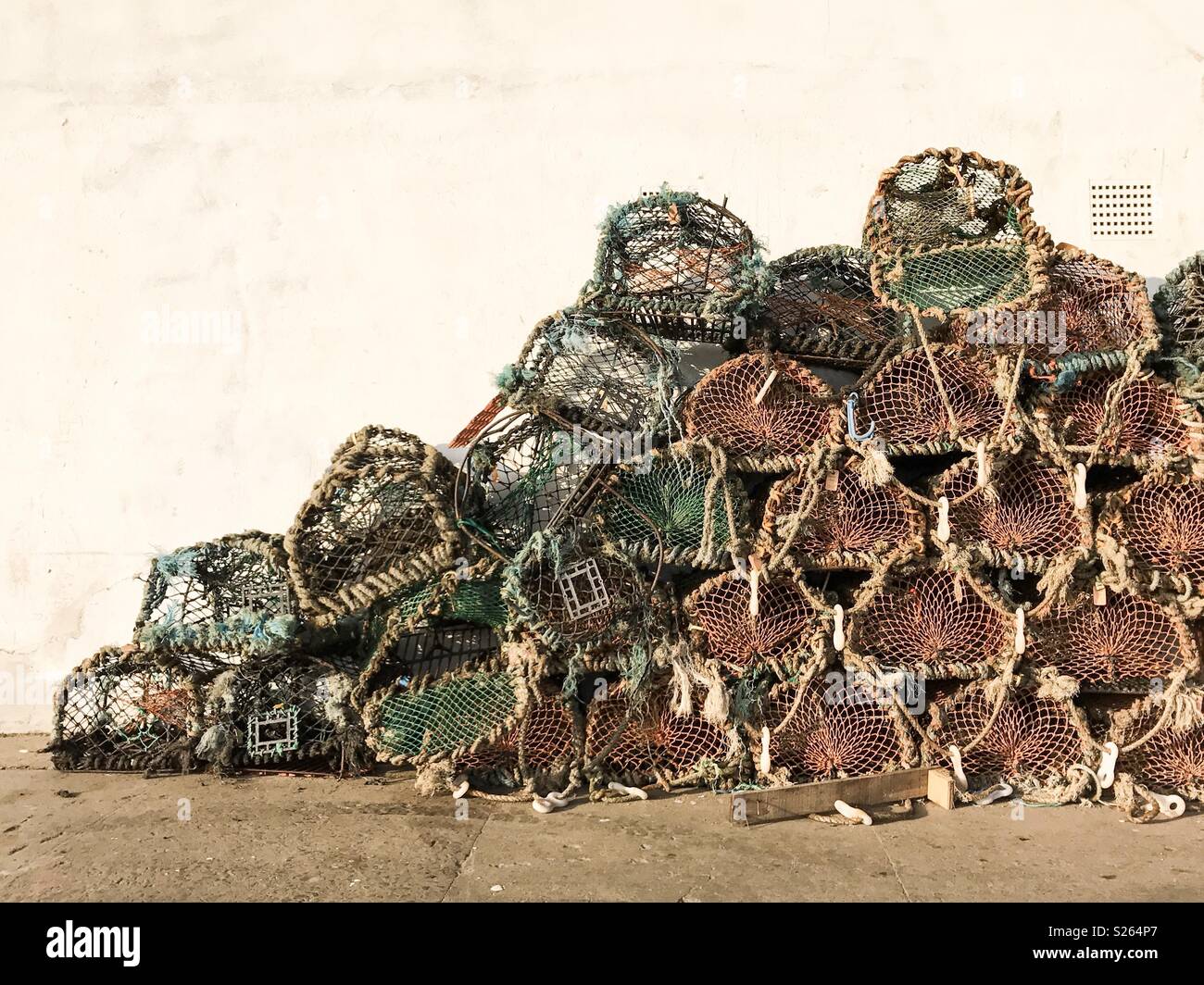 A stack of crab and lobster pots at North Shields Fish Quay, Tyne and Wear, England. Stock Photo
