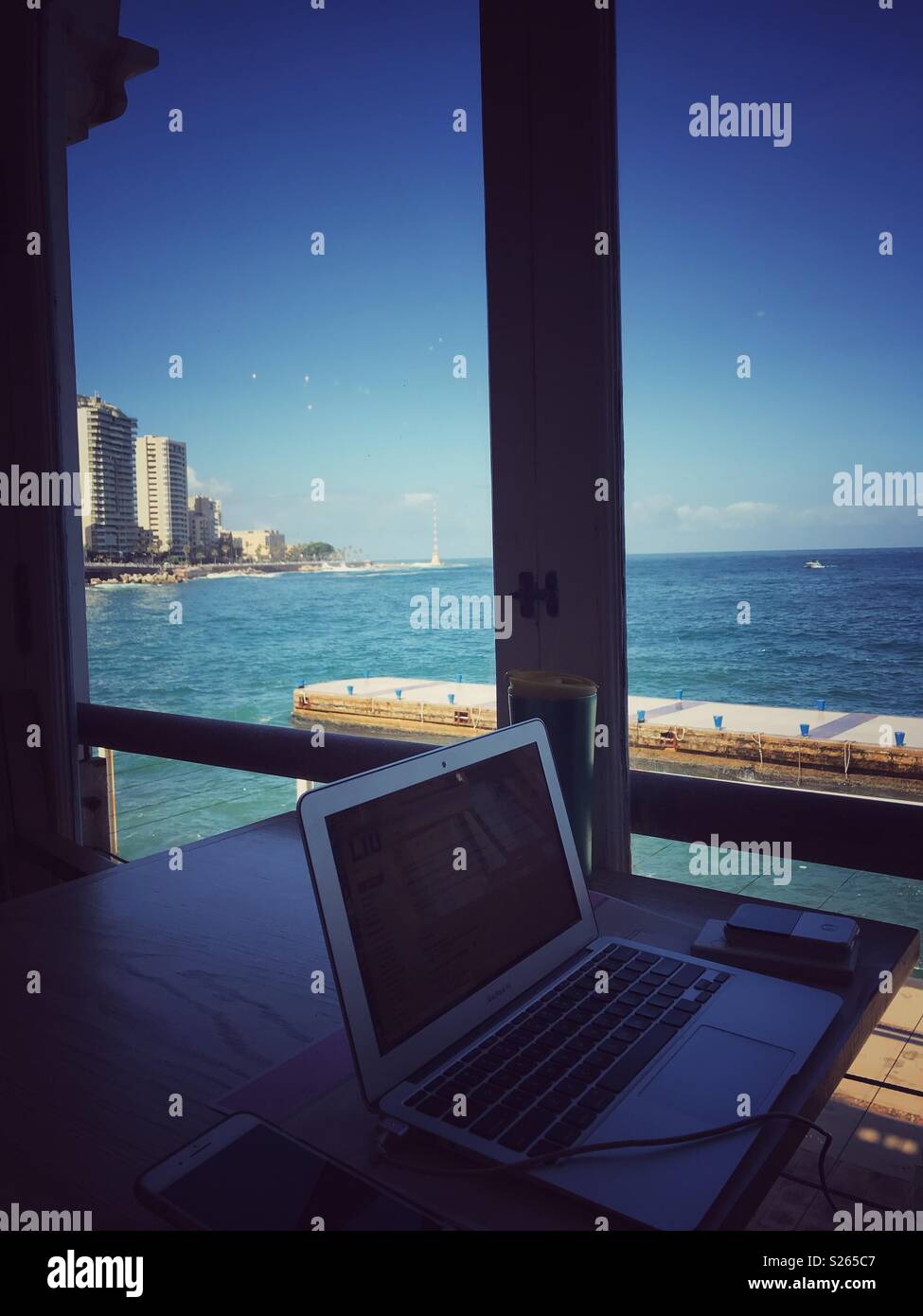 Working with a relaxing view - Smartphone Captured Stock Image