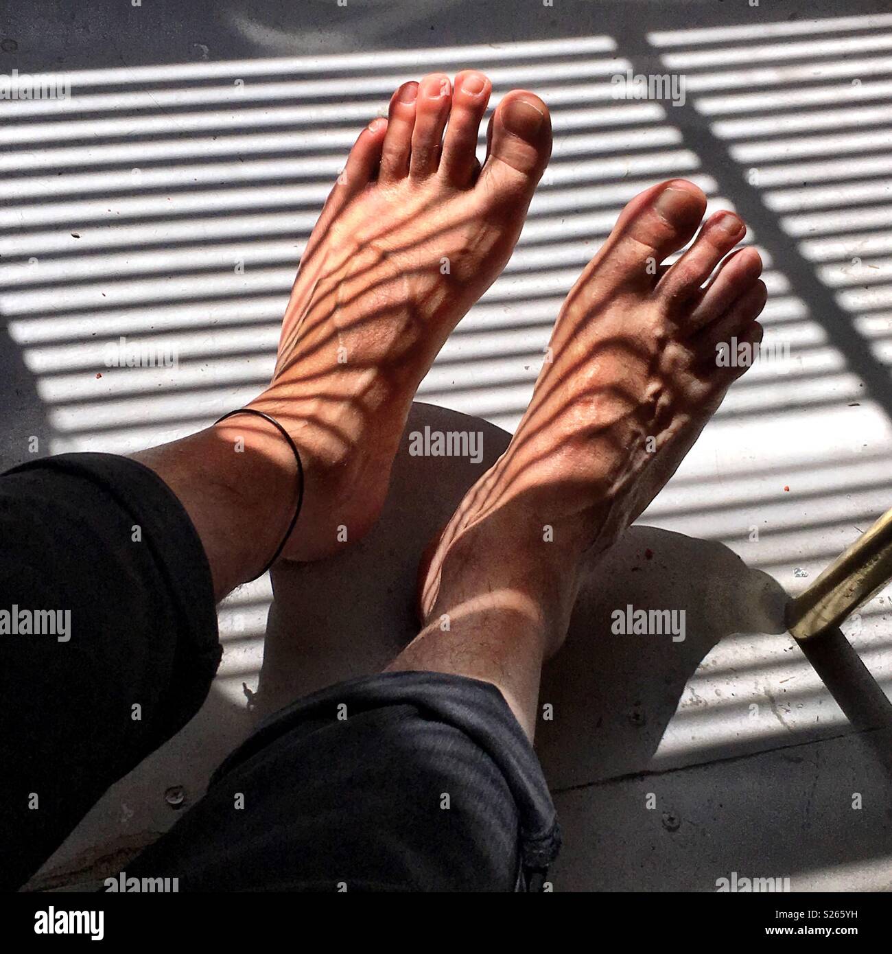 Male feet hi-res stock photography and images - Alamy