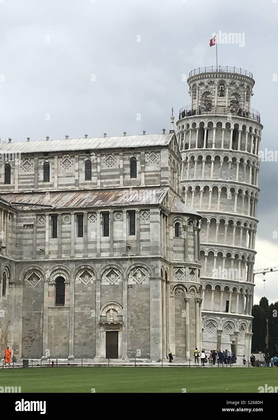 The Leaning Tower of Pisa, Italy. The man in orange on the bottom left is a monk from India we met. - Smartphone Captured Stock Image