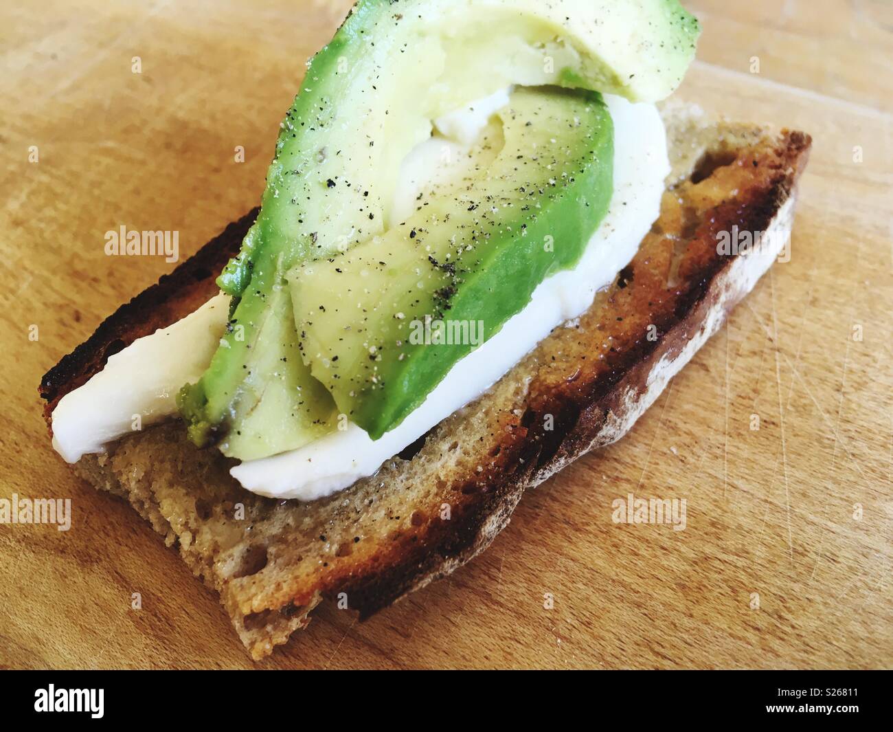 Avocado and mozzarella on a toasted rye bread - Smartphone Captured Stock Image