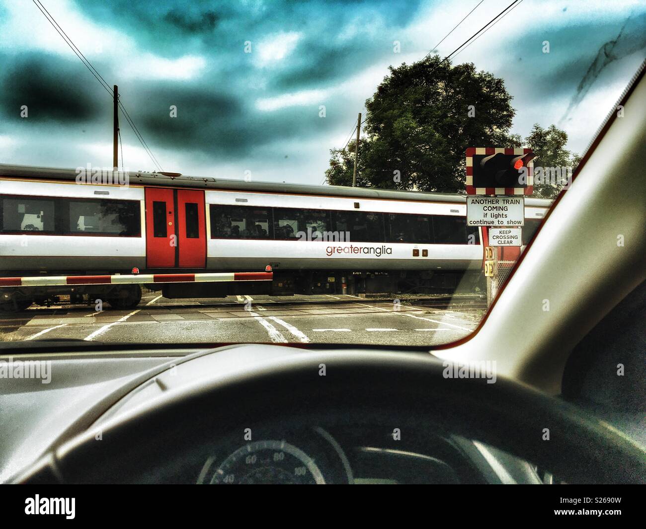 Greater Anglia passenger train on the East Suffolk branch line, Yoxford, Suffolk, UK. - Smartphone Captured Stock Image