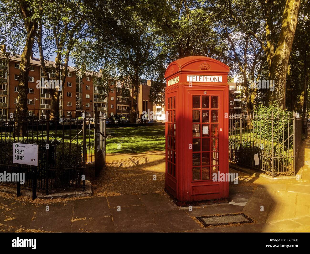 Old public phone cabin in a square of London - Smartphone Captured Stock Image