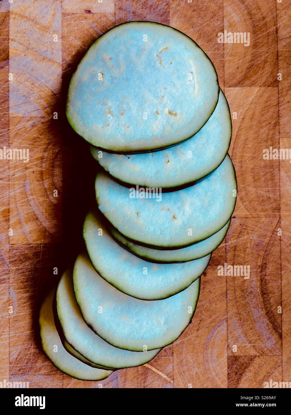 Sliced aubergine on chopping board - Smartphone Captured Stock Image
