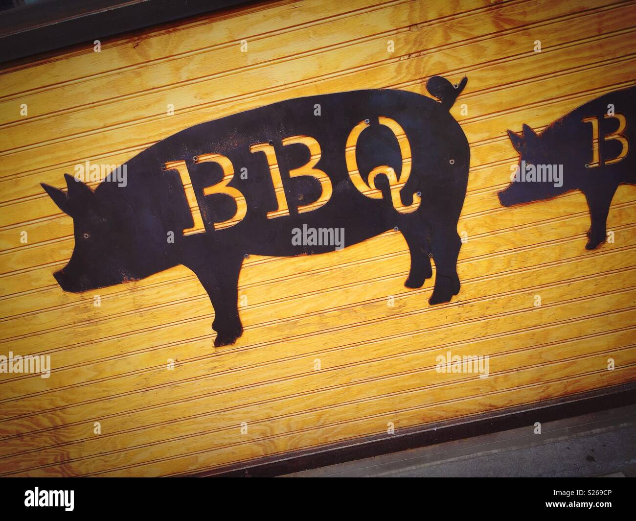 Sign in the front of a pit barbecue restaurant, United States. - Smartphone Captured Stock Image