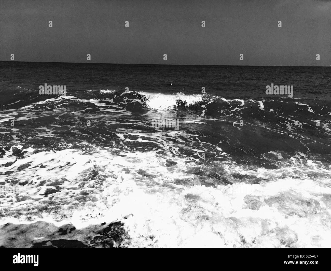Foam waves at shore Black and White Stock Photos & Images - Alamy