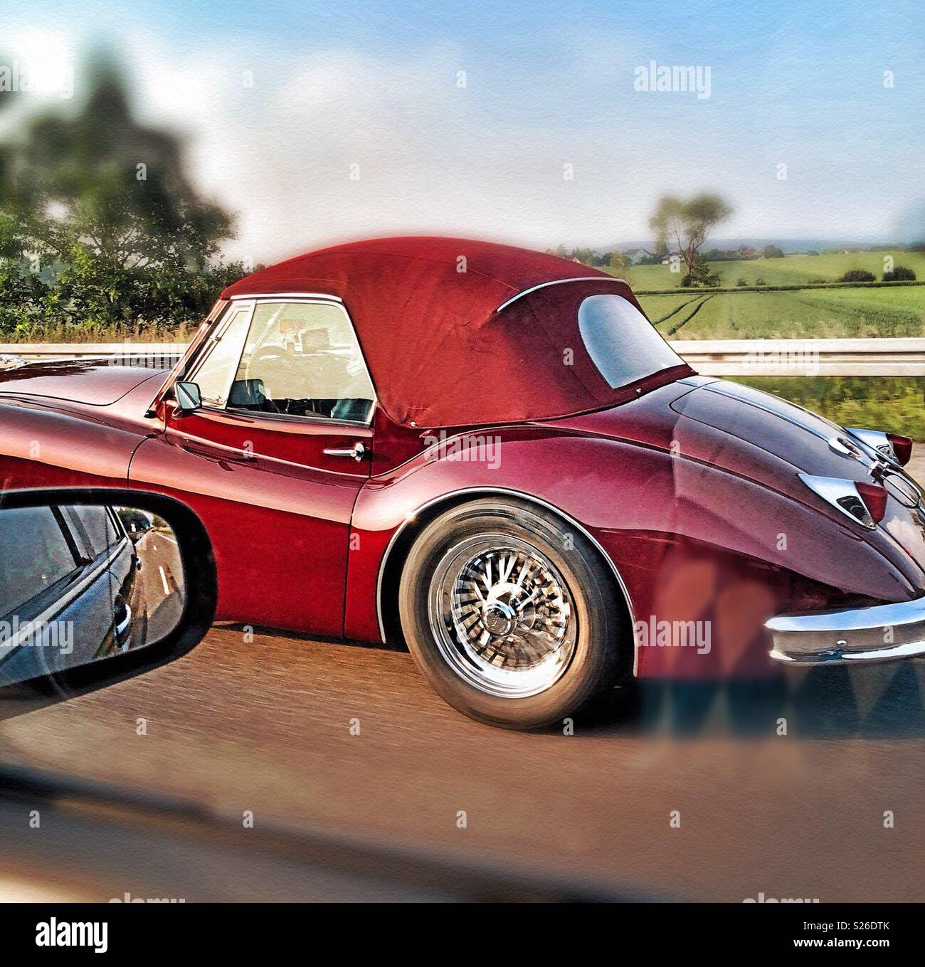 Ob the road, Jaguar  XK 140. With Reflections. - Smartphone Captured Stock Image